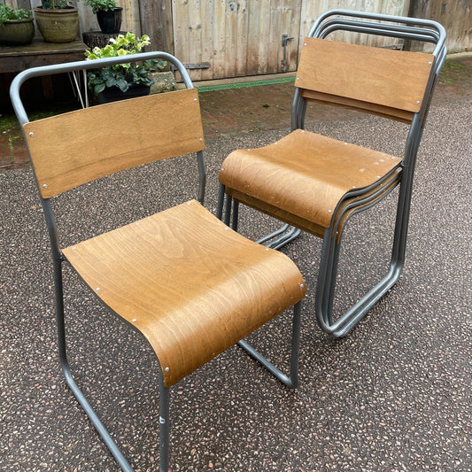 four bent steel and birch play stackable dining chairs